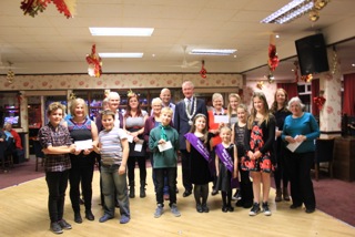 Cllr Martin Thomas, town council chair, with group representatives who received grants